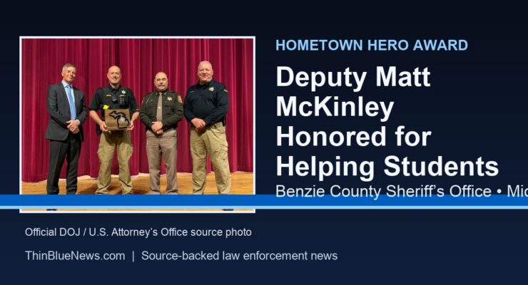 Deputy Matt McKinley receives the Hometown Hero Award in a ThinBlueNews card using an official DOJ source photo