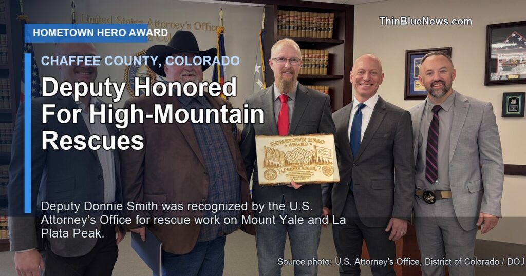 Chaffee County Sheriff’s Deputy Donnie Smith receives the Hometown Hero Award from United States Attorney Peter McNeilly; ThinBlueNews headline overlay added.