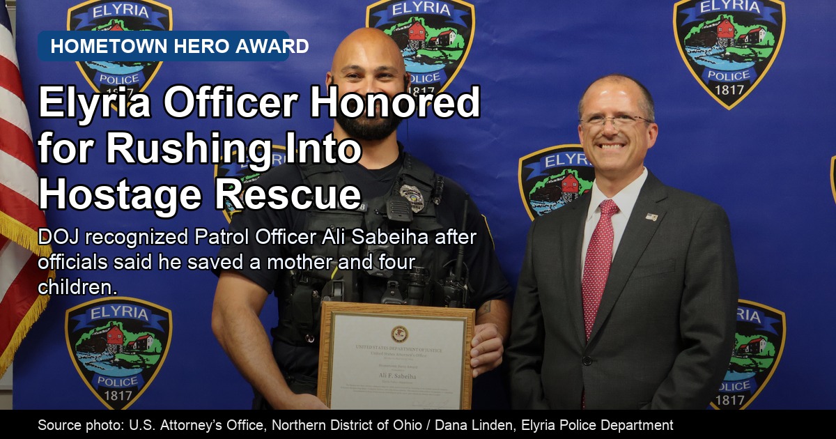 Patrol Officer Ali Sabeiha and U.S. Attorney David M. Toepfer at a Freedom 250 Hometown Hero recognition, with ThinBlueNews headline overlay