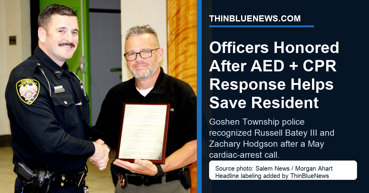 Salem News photo by Morgan Ahart showing Goshen Township Police Chief John Calko presenting the department Life-Saving Award to Officer Russell Batey III, with ThinBlueNews headline and source labeling added.