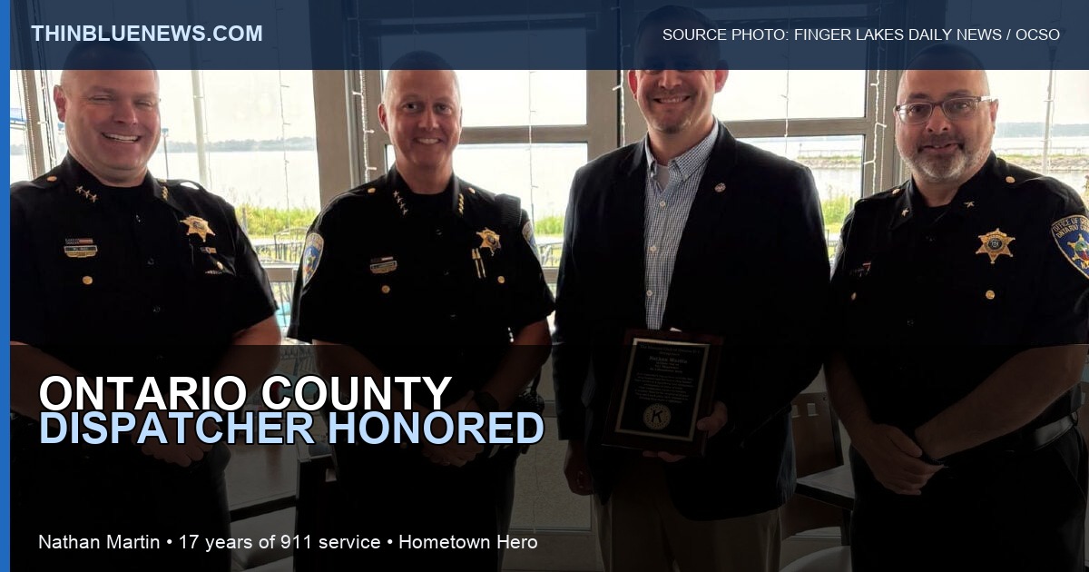 Finger Lakes Daily News source photo credited to the Ontario County Sheriff's Office/Facebook showing Senior Communications Officer Nathan Martin with sheriff's office members after a Hometown Hero honor; ThinBlueNews added headline and source labeling.