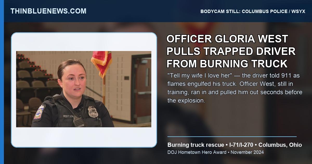 Bodycam still from Columbus Division of Police showing a burning pickup truck on I-71/I-270 after a crash; Officer Gloria West rescued the trapped driver moments before the fire fully engulfed the vehicle. Source: Columbus Police via WSYX.