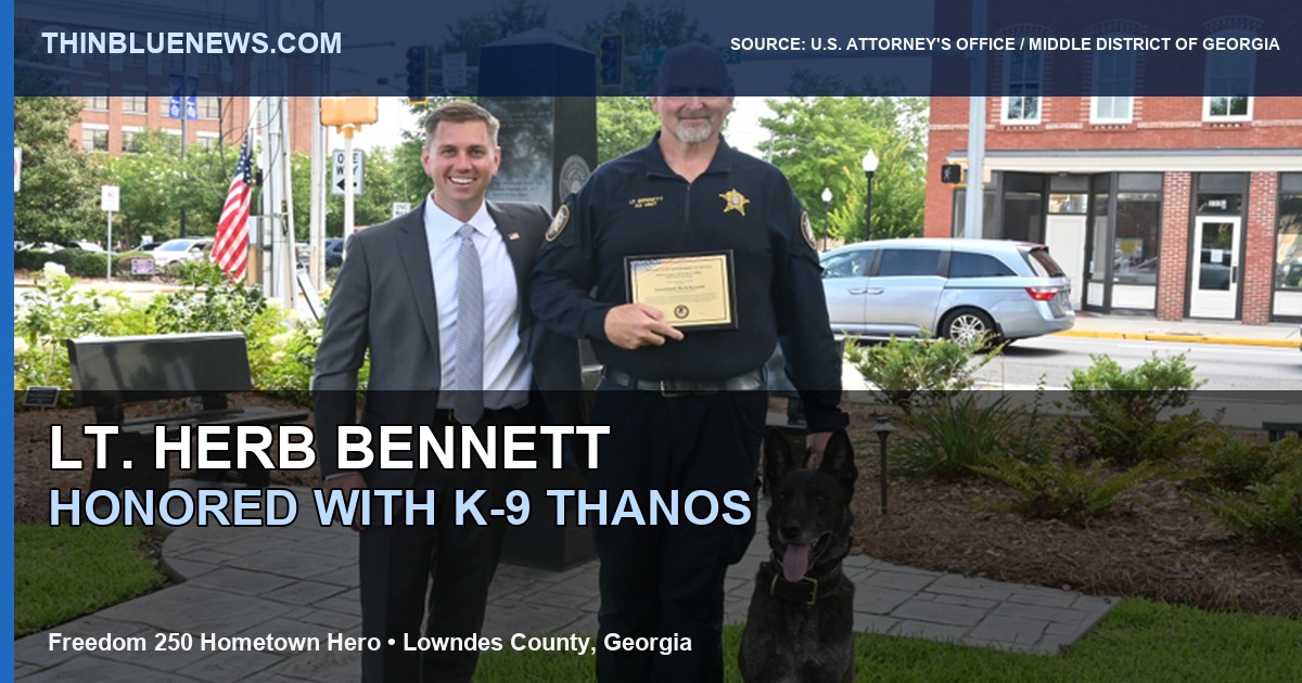U.S. Attorney’s Office official photo showing Lowndes County Lt. Herb Bennett and K-9 Thanos with U.S. Attorney Will Keyes at the Hometown Hero event; ThinBlueNews added headline and source labeling.