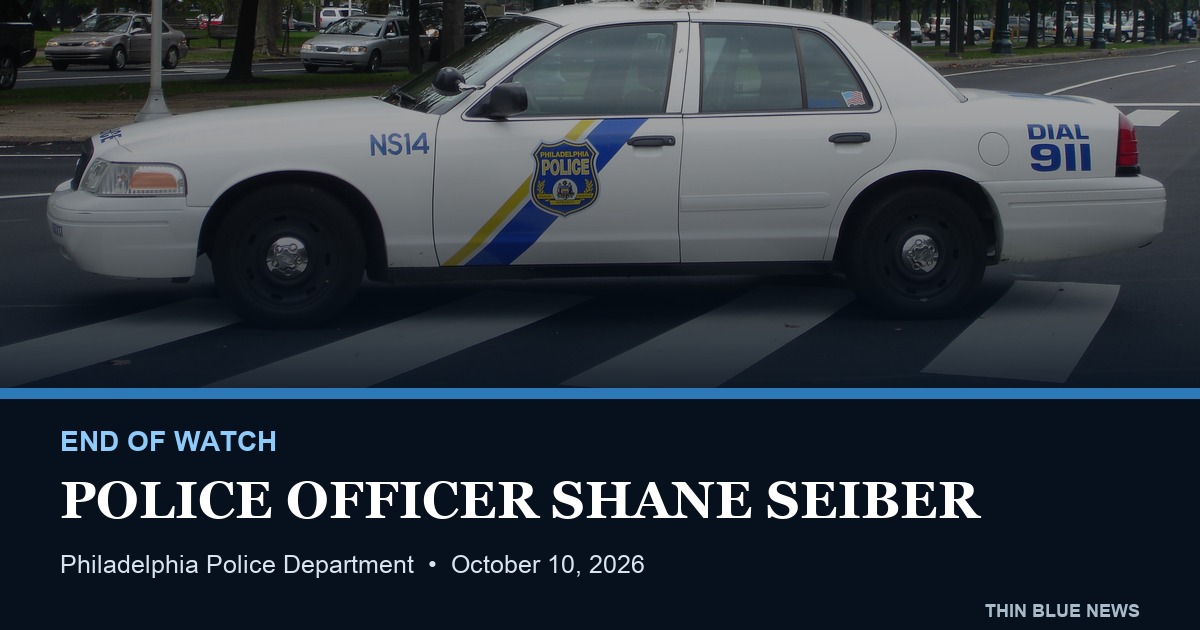 Contextual licensed photograph of a Philadelphia Police Department cruiser in a ThinBlueNews memorial for Police Officer Shane Seiber; not an incident image